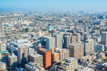 Fototapeta premium Asia business concept for real estate and corporate construction - panoramic urban city skyline aerial view under blue sky and sunny day in funabori, tokyo, Japan