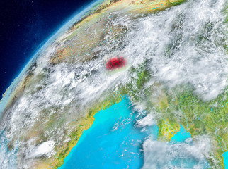 Space view of Bhutan in red