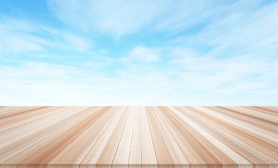 Design concept - Empty wood table top with cloudy sky background for display or montage product
