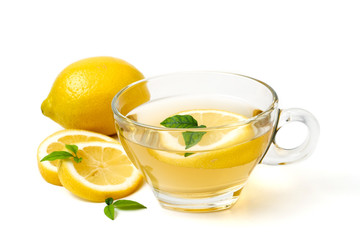 A cup of tea and lemon on a white background