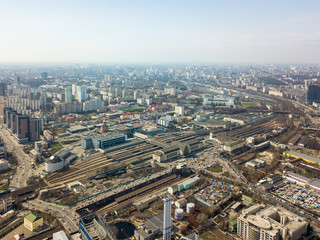 Fototapeta na wymiar Panoramic view of the city of Kiev with modern high-rise buildings and a railway station