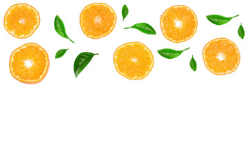 Slices of orange or tangerine with leaves isolated on white background with copy space for your text. Flat lay, top view