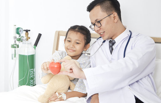 doctor with kid girl patient