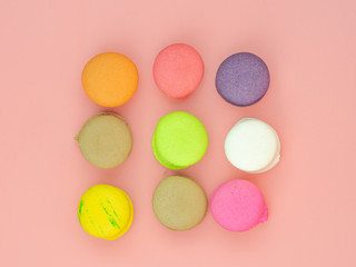 colorful macaron or macaroon on pink background