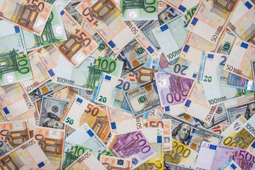 Two leading currencies - dollar and euro bills for desing