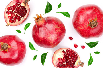 pomegranate with leaves isolated on white background. Top view. Flat lay pattern