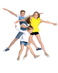 Fototapeta na wymiar A group of children jumping and waving.