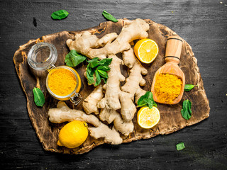 Fresh ginger with lemons and mint.