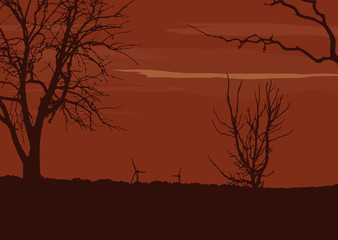 Landscape with a wind power plants and trees without leaves, under an orange sky with clouds - with space for your text