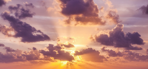 Bright colorful sunset sky, clouds and sun rays, natural background and texture - Powered by Adobe