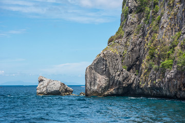 Fototapeta na wymiar Cliff over sea surface close-up