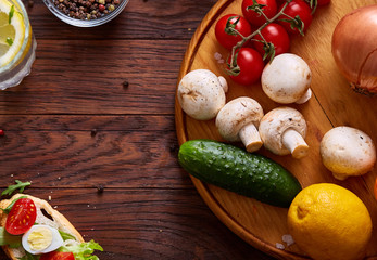 Breakfast sandwich with homemade paste, vegetables and fresh greens, shallow depth of field