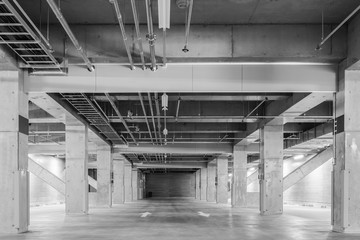 Parking garage underground interior, neon lights at night..