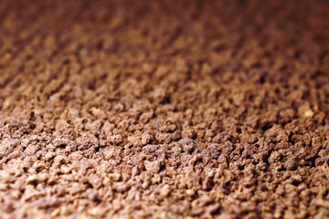 Instant coffee in granules. Instant coffee background macro.