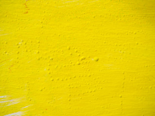 yellow paint on white Board