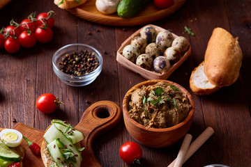 Breakfast still life with sandwiches, quail eggs, spicies and fresh fruits and vegetables, selective focus