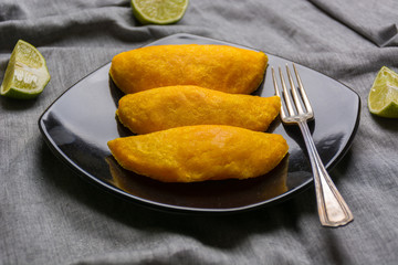 Colombian empanadas, made of meat and fried in oil.