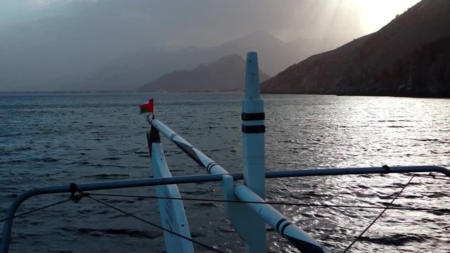Ship travel sails along Musandam peninsula, Sultanate of Oman, Gulf of Oman