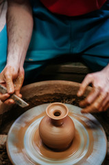 Man making pottery art, clay work close up hands shot