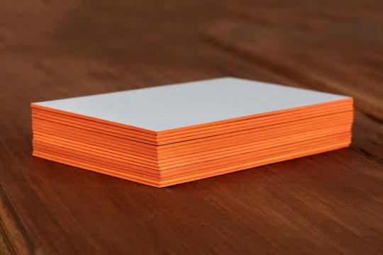 Stack of blank layered business cards with painted edges
