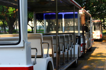 White shuttle bus on the street.