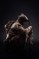 Special forces United States soldier or private military contractor. Image on a black background.