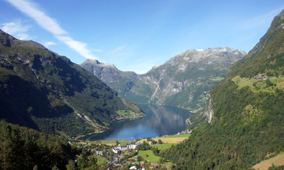 Fototapeta na wymiar Scenic aerial view of the Geiranger fjord, beautiful norwegian nature, blue sky, Norway