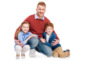 happy father with cute little kids smiling at camera isolated on white
