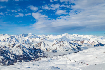 Fototapeta na wymiar Picturesque view snowy mountain peaks panorama, Les Menuires ,Alps, France, ski slopes in 3 Valleys
