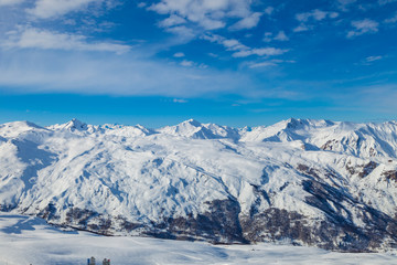 Picturesque view snowy mountain peaks panorama, Les Menuires ,Alps, France, ski slopes in 3 Valleys