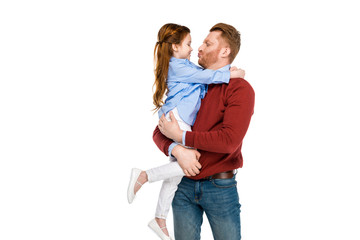 happy father and daughter smiling each other and hugging isolated on white