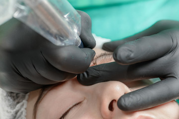 Permanent makeup. Permanent tattooing of eyebrows