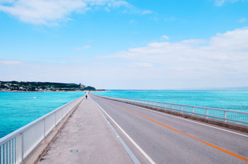 Obraz na płótnie Canvas Kouri bridge cross over blue sea to Kouri island, Naha, Okinawa, Japan