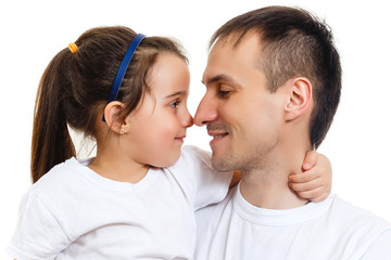 Girl hugging her father isolated over a white background