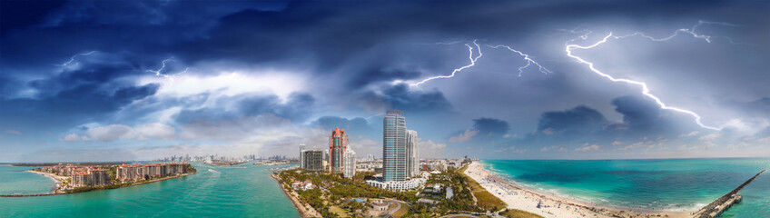 Panoramic aerial view of Miami Beach and South Pointe Park at dusk