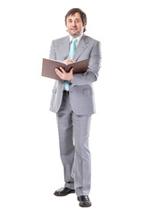 portrait of confident businessman with documents on white background