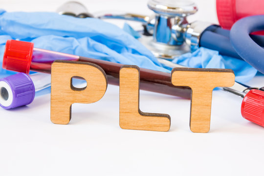 Abbreviation or acronym of PLT, in laboratory, scientific, research or medical practice means platelet count, is in foreground with laboratory test tubes, medical stethoscope and gloves on background