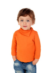Beautiful little child two years old wearing jeans and orange jersey © Gelpi