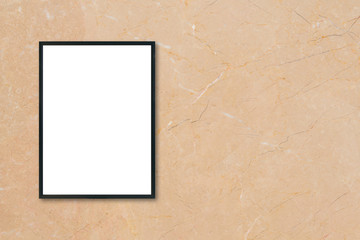 Mock up blank poster picture frame hanging on brown marble wall background in room - can be used mockup for montage products display and design key visual layout.