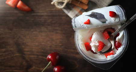 Fresh yogurt with berries. Ice cream in a bowl with fresh and ju