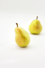 Yellow ripe pears isolated on white background