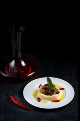 Delicious cooked couscous with meat on a white plate