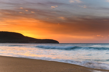 Obraz premium Sunrise Seascape over the Headland