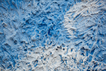 Blue and white decorative plaster on the wall like a sky. Art background