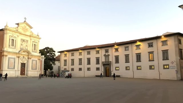 PISA, ITALY - JANUARY 18, 2018: Tourists in Knights Square at night. This is one of the most famous downtown squares
