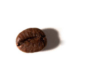 Coffee cup and beans on old kitchen table. Top view with copyspa