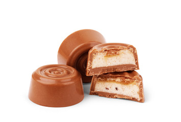 Chocolate candies in a cut on a white background
