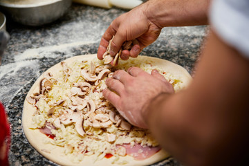 Obraz na płótnie Canvas Making Pizza