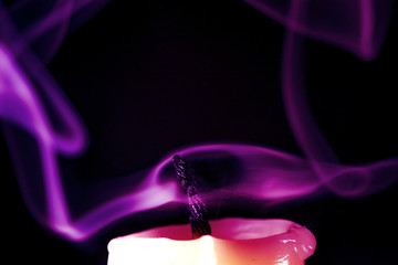 the flames and smoke from candles and matches colored evaporation of wax
