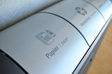 Modern recycle box for garbage. Recycle box for paper, plastic and other type of garbage inside office building.